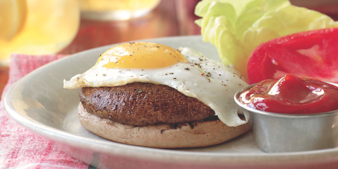 a mushroom burger with a fried egg