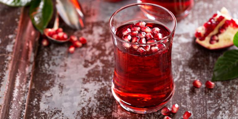 An icy glass of pomegranate-apricot sparkler